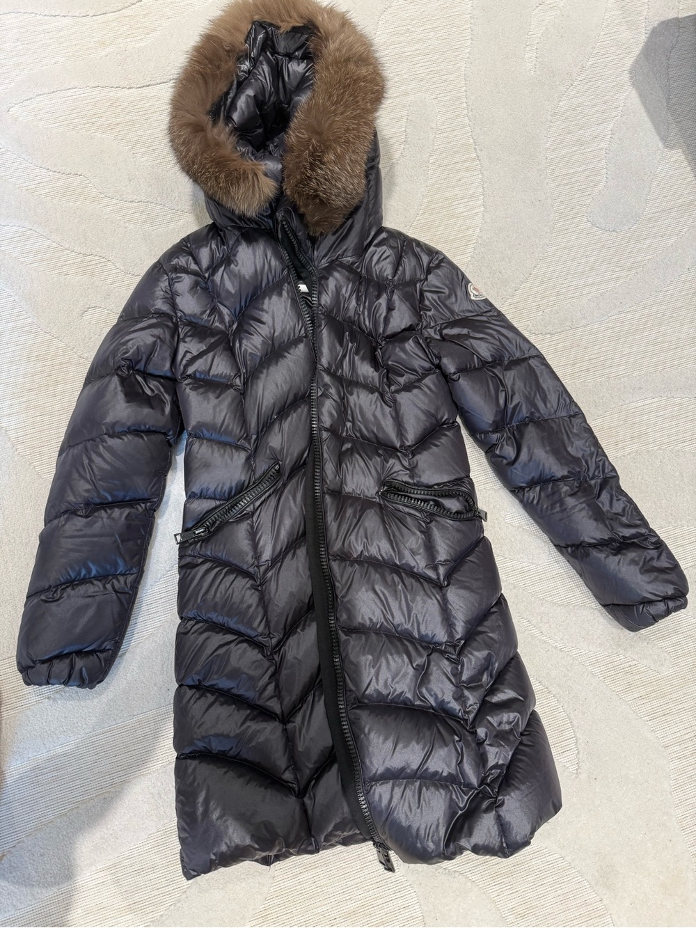 Moncler Womenβs Black Down Puffer Coat with Brown Fur-Trim Hood